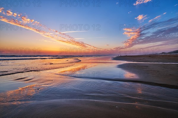 Atlantic ocean after sunset with surging waves at Fonte da Telha beach