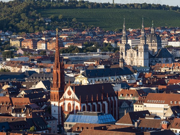 View of red Gothic Lady Chapel and Baroque Haug Abbey with dome