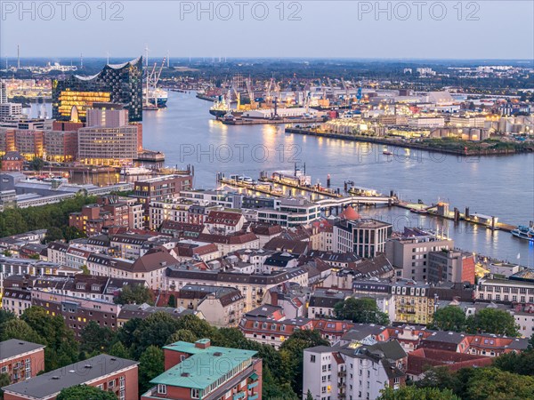 Aerial view of Hamburg harbour at blue hour with Landungsbruecken and Elbe Philharmonic Hall