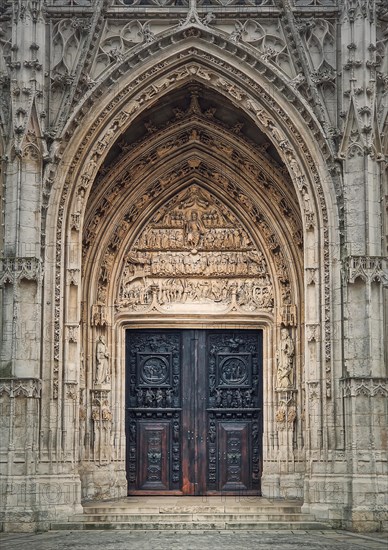 Saint Maclou Church entrance door