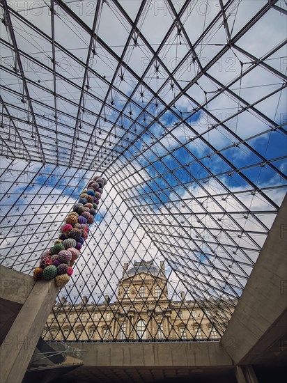 Underneath the Louvre glass pyramid