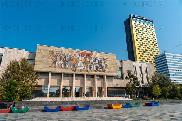 Beautiful painting of the revolution at the entrance to the National Historical Museum in Skanderbeg Square in Tirana. Albania