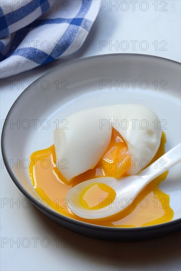 Soft boiled egg with spoon