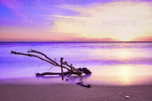 Sunset on sandy beach