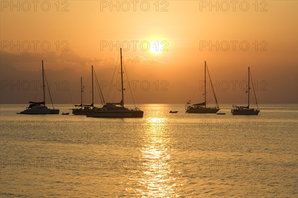 Sunset with sailboats