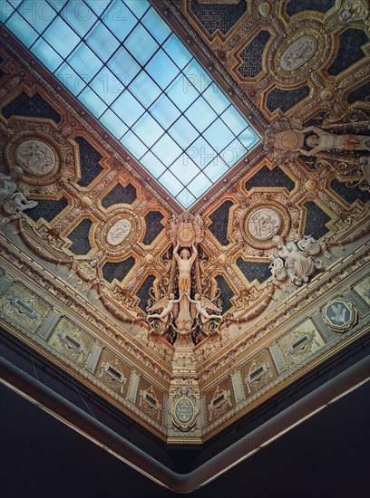 Ceiling architectural details of the Salon Carre inside Louvre museum