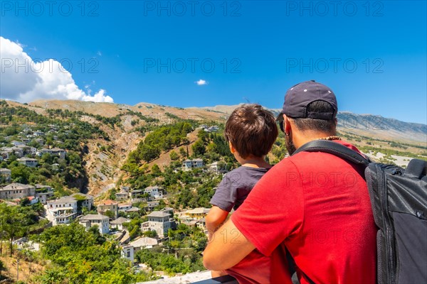 A father with his son in the Ottoman Castle Fortress of Gjirokaster or Gjirokastra. Albanian