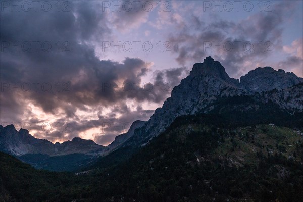 Night falls in the Valbona Valley along a trail