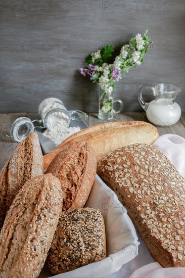 Loaves and loaves of rustic artisan bread made with different types of seeds and flours