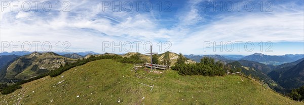 Drone image of the summit cross on the Pitscherberg with a view of the Osterhorn