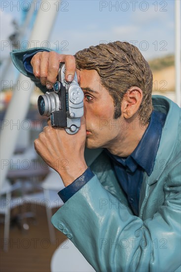 Sculpture of a photographer