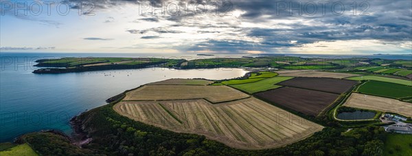 Panorama of Sunset over Fields and Farms from a drone