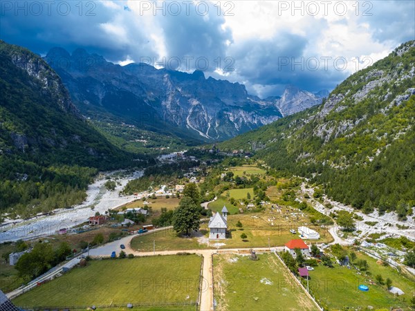 Aerial drone view over the Catholic Church in the valley of Theth national park