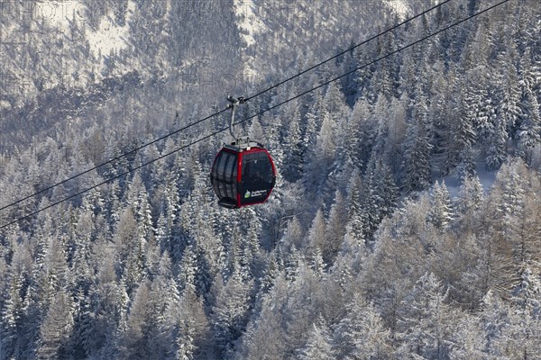 Winter landscape with Zwoelferhorn cable car