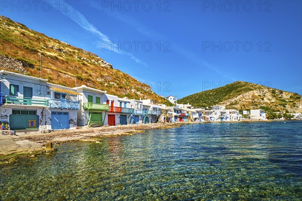 Colorful village of Klima with Greek whitewashed houses on sunny day