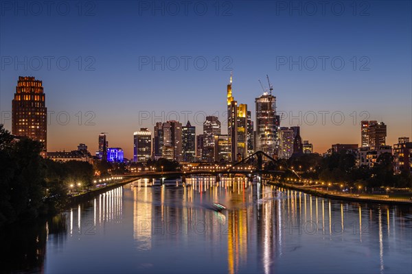 The sun has set behind Frankfurt's banking skyline