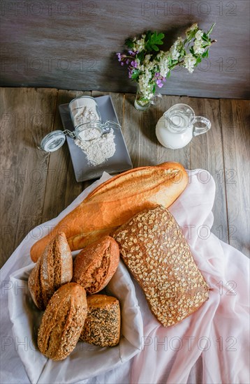 Loaves and loaves of rustic artisan bread made with different types of seeds and flours