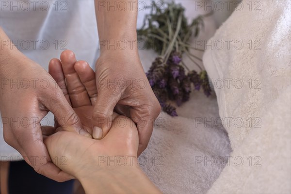 Hand massage in the massage therapist's office. Close up shot. Relaxing massage