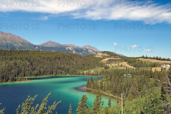 Transparent clear lake with green water colour