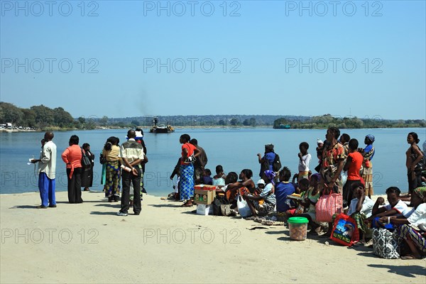 People on the Zambezi River waiting for the ferry