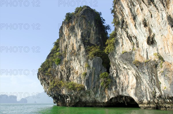 Chalk cliffs and green sea