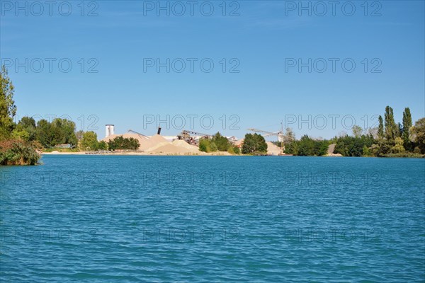 Gravel quarry at excavation lake called 'Betonsee' in Waghaeusel-Wiesental