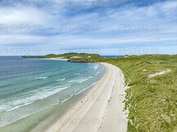 Aerial view of Balnakeil Beach and the Faraid Head peninsula with sandy beach and dune landscape