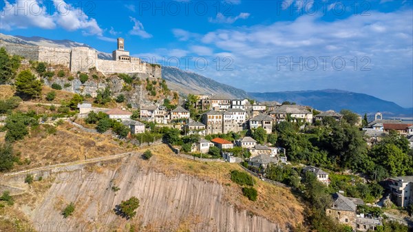 Aerial drone view of the old castle and fortress of the city of Gjirokaster or gjirokastra