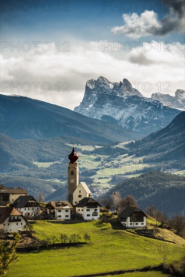 Snow-covered mountains and church