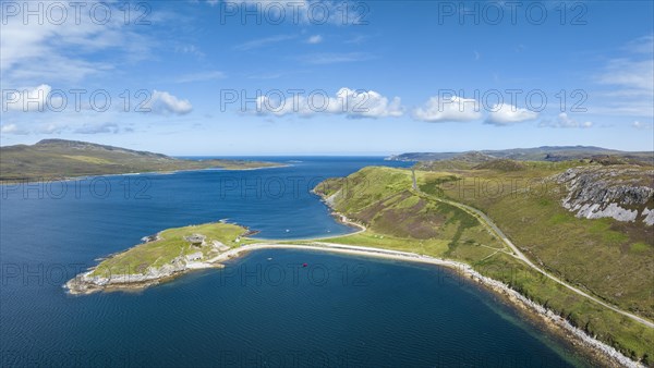 Aerial panorama of the Ard Neaki peninsula in the sea loch of Loch Eribol with the abandoned lime kilns and ferry house