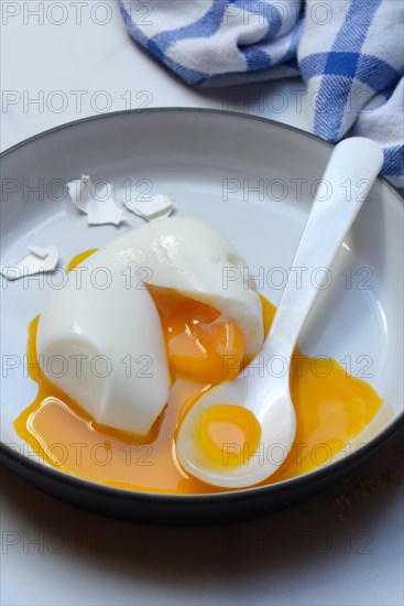 Soft boiled egg with spoon