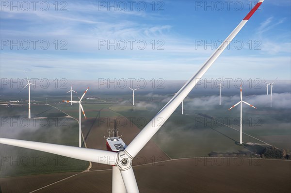 Tomerdingen wind farm in the Swabian Alb. Fog is rolling in