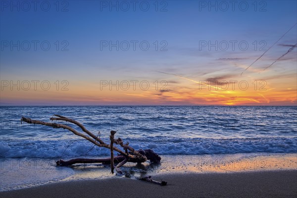 Sunset on sandy beach