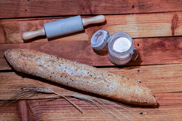 Loaf of rustic artisan bread with different types of seeds