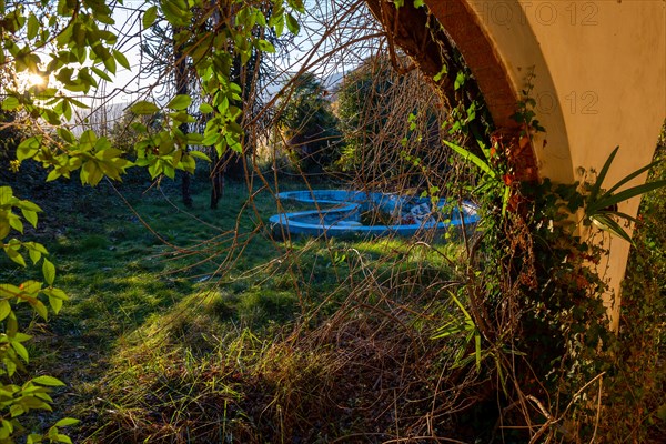 Abandoned House with Swimming Pool in a Sunny Day in Switzerland