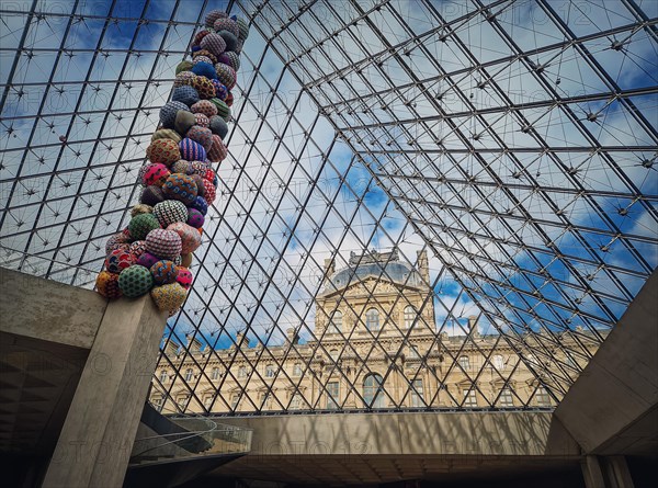 Underneath the Louvre glass pyramid. Beautiful architectural details with an abstract mixture of classical and modern architecture styles