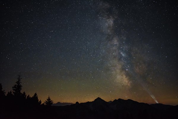 Starry sky with the Milky Way above the Sonntagshorn