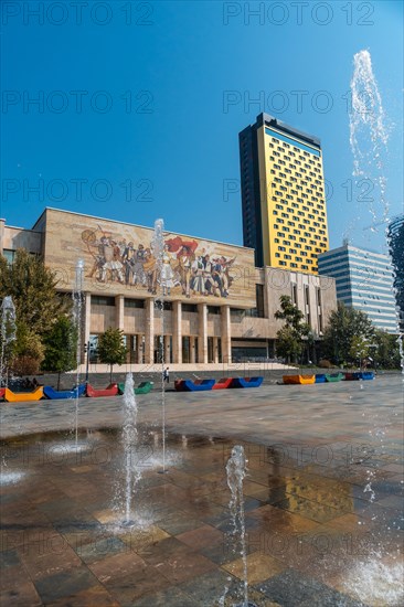 Water jets next to the National Historical Museum in Skanderbeg Square in Tirana. Albania