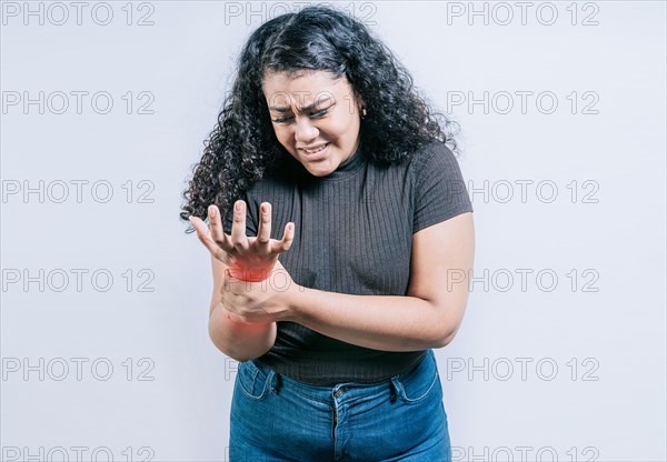 Young woman with arthritis isolated.. Wrist pain and arthritis concept. People with wrist pain and arthritis isolated