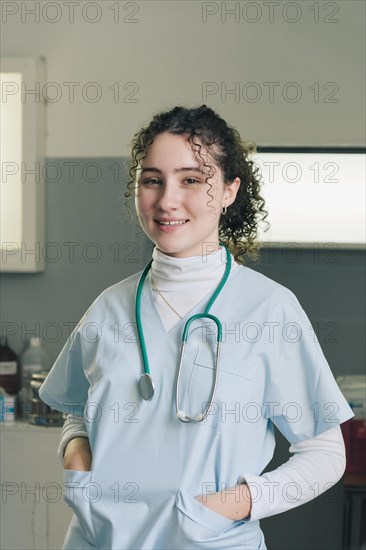 Medical concept of beautiful female doctor in white coat with stethoscope
