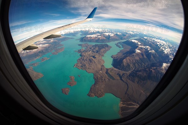 View from the plane of the snow-capped Andes and Lago San Martin