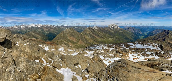 Panorama view from the summit of the Schneespitze to the Stubai Alps