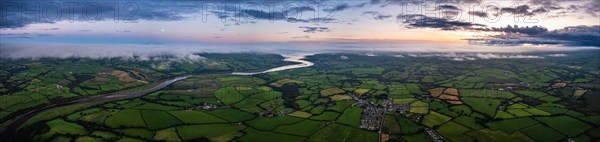 Panorama of Twilight over Fields and Farms from a drone