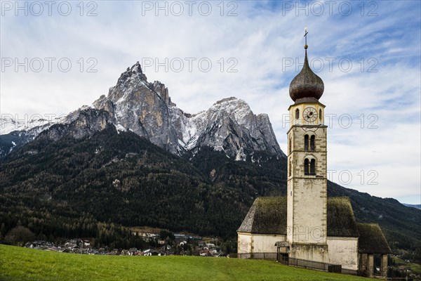 Snow-covered mountains and church