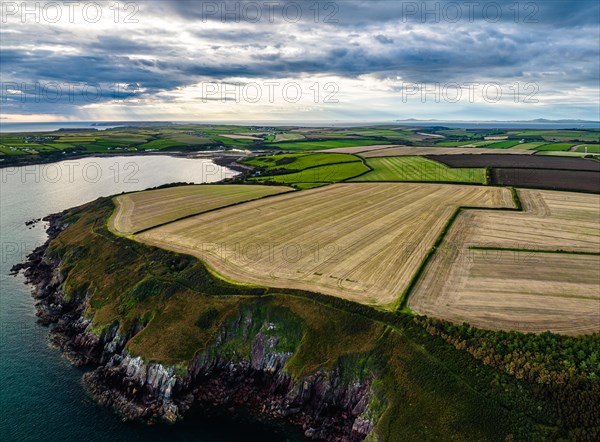 Sunset over Fields and Farms from a drone