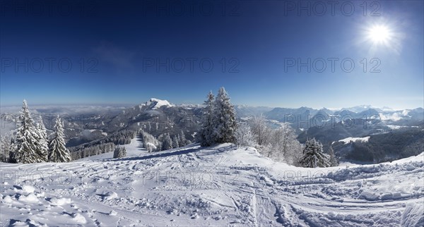 Winter landscape with ski tracks in deep snow