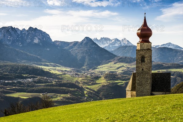 Snow-covered mountains and church