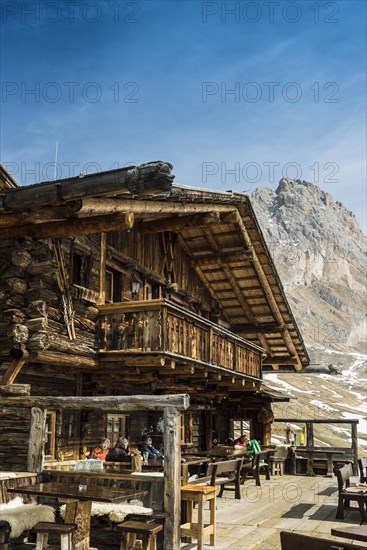 Snow-covered mountains and ski hut