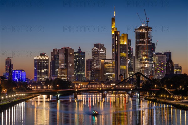 The sun has set behind Frankfurt's banking skyline
