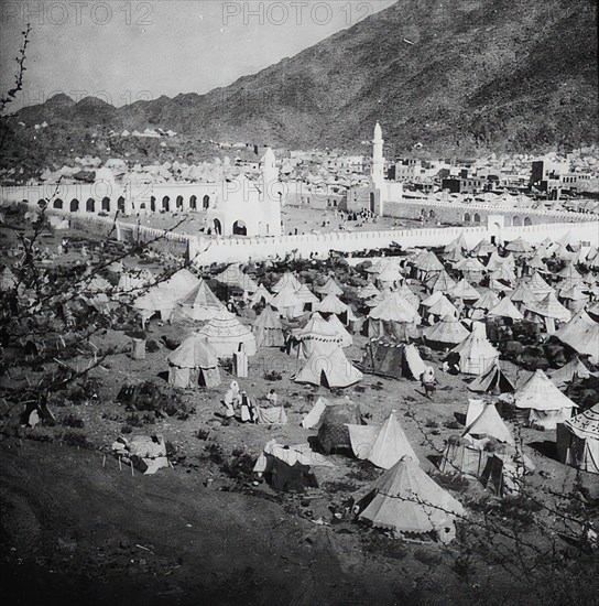 View of Mecca with the Kaaba with tents of the pilgrims in front of the city